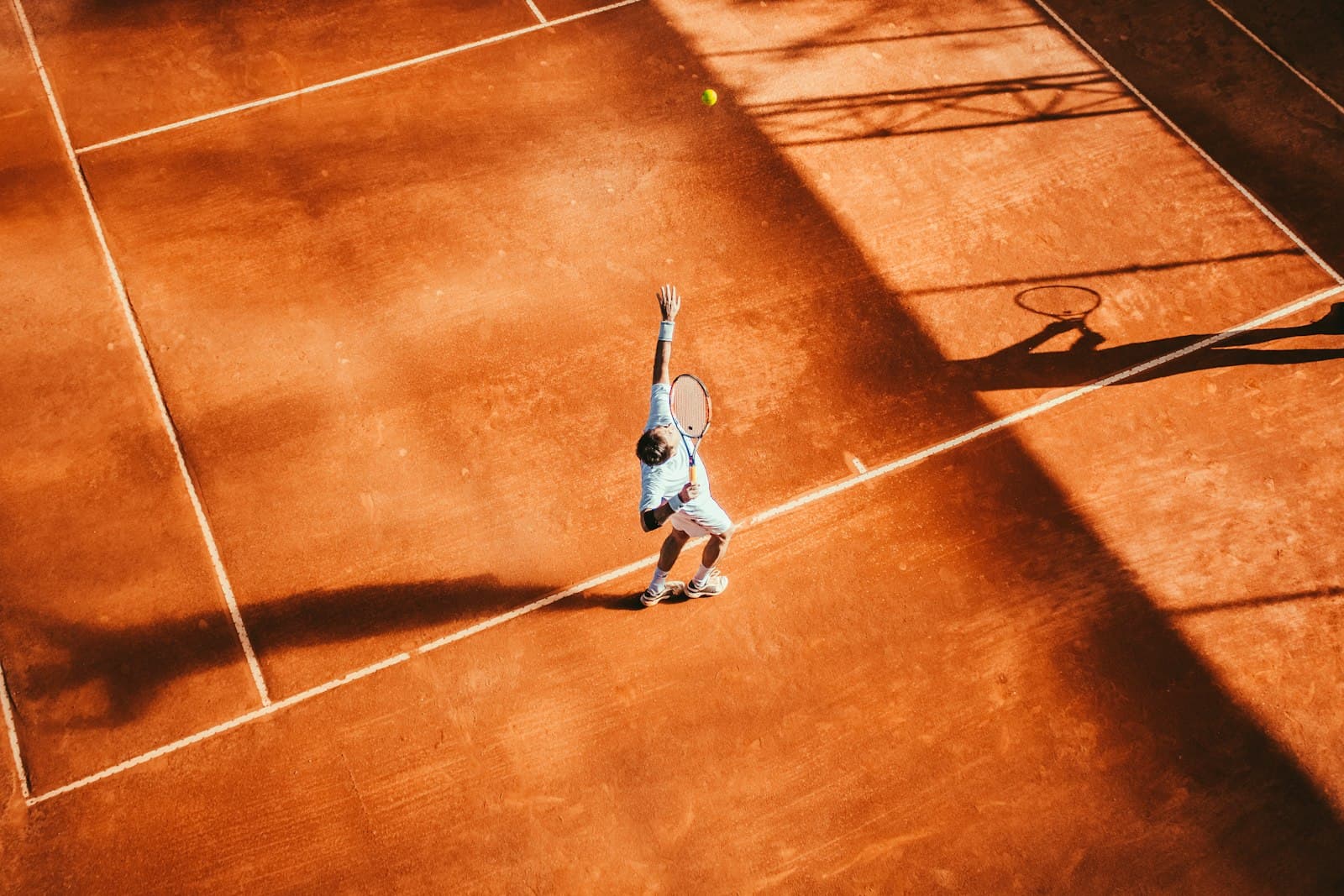 Tennis courts at a sports club in soft evening light